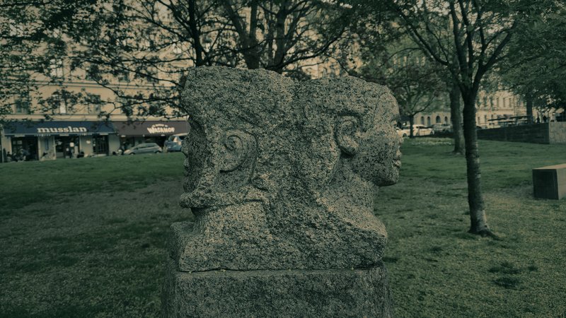 Two-faced sculpture